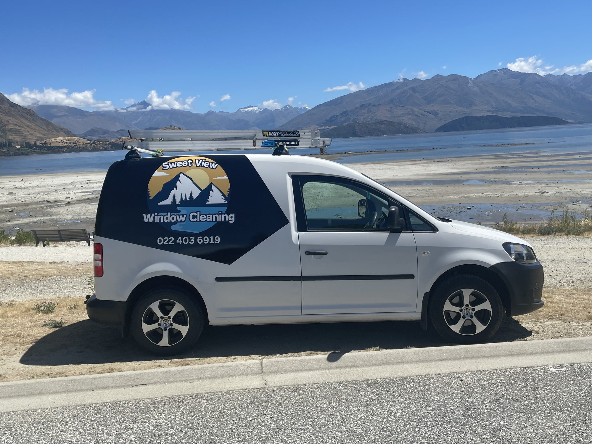 Sweetview Window Cleaning van beside Lake Wanaka